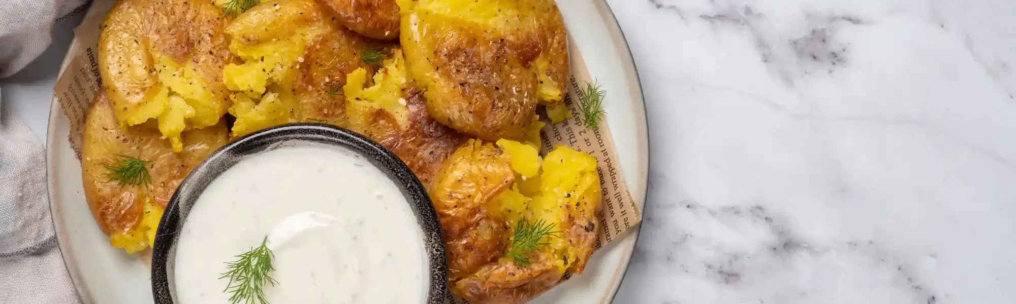 Smash Potatoes al Curcuma Bio e salsa ai Semi di Zucca B – Amoseeds Italia
